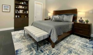 Modern hill country master bedroom Custom headboard in gray and blue